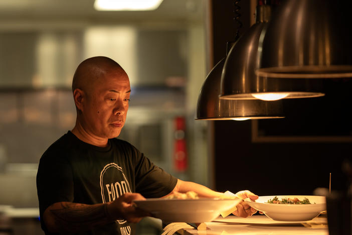 Chef Jojo Vasquez in the open kitchen of FOND – a Neighborhood Eatery, in west Maui.