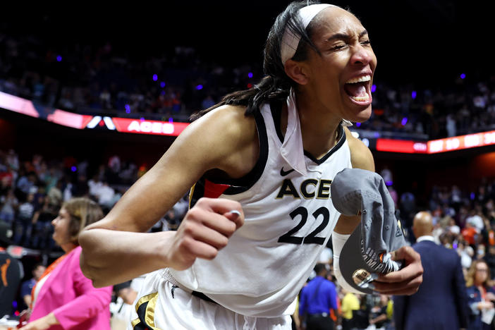 A'ja Wilson of the Las Vegas Aces celebrates after defeating the Connecticut Sun to win the 2022 WNBA Finals.