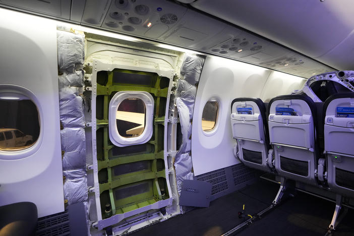 A door plug area of an Alaska Airlines Boeing 737 Max 9 aircraft awaiting inspection is pictured with paneling removed at the airline's facilities at Seattle-Tacoma International Airport on Jan. 10 in SeaTac, Wash.