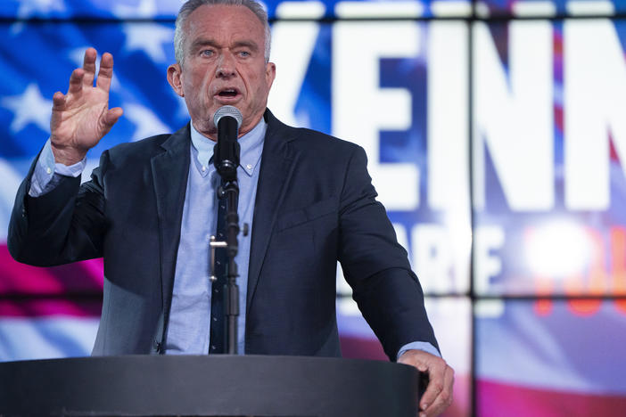 Independent presidential candidate Robert F. Kennedy Jr. speaks during a campaign rally in Phoenix on Dec. 20, 2023. Both Kennedy's campaign and a super PAC supporting him are working to get the conspiracy theorist on state ballots around the country.