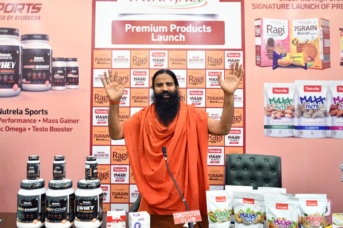 Yoga guru Baba Ramdev, the brand ambassador for the billion dollar company Patanjali Ayurved, addresses the media during a launch of "premium products" in New Delhi.