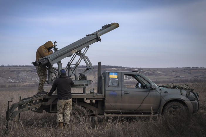 Ukrainian soldiers from The 56th Separate Motorized Infantry Mariupol Brigade prepare to fire a multiple launch rocket system based on a pickup truck towards Russian positions at the front line, near Bakhmut, Donetsk region, Ukraine, March 5, 2024.