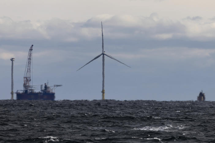 The first operating South Fork Wind farm turbine stands east of Montauk Point, N.Y., on Dec. 7, 2023. South Fork Wind, America's first commercial-scale offshore wind farm, is officially open.