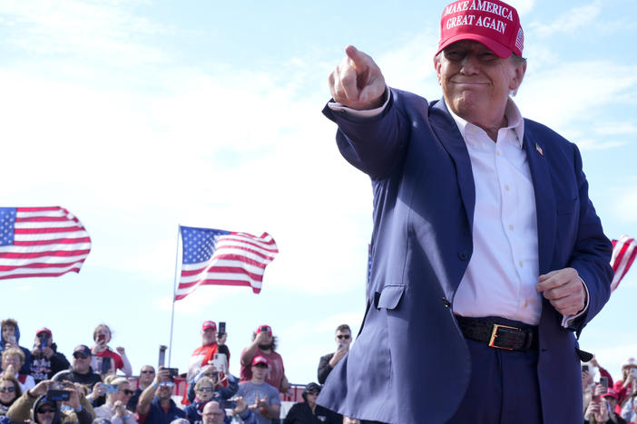 Republican presidential candidate former President Donald Trump gestures to the crowd at a campaign rally Saturday, March 16, 2024, in Vandalia, Ohio.
