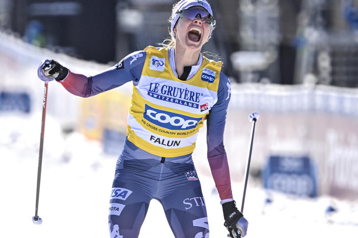 Jessie Diggins celebrates winning the Women's 20 km Mass Start FIS World Cup skiing competition in Falun, Sweden, on Sunday.