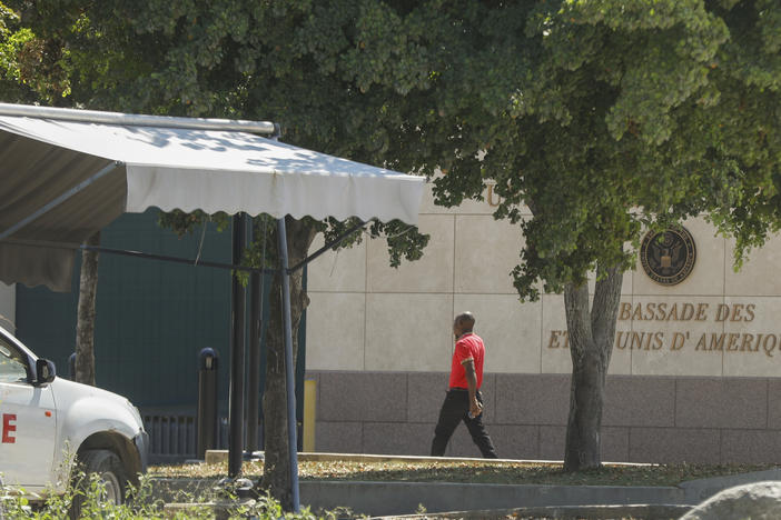 A man enters the U.S. embassy in Port-au-Prince, Haiti, Sunday, March 10, 2024.