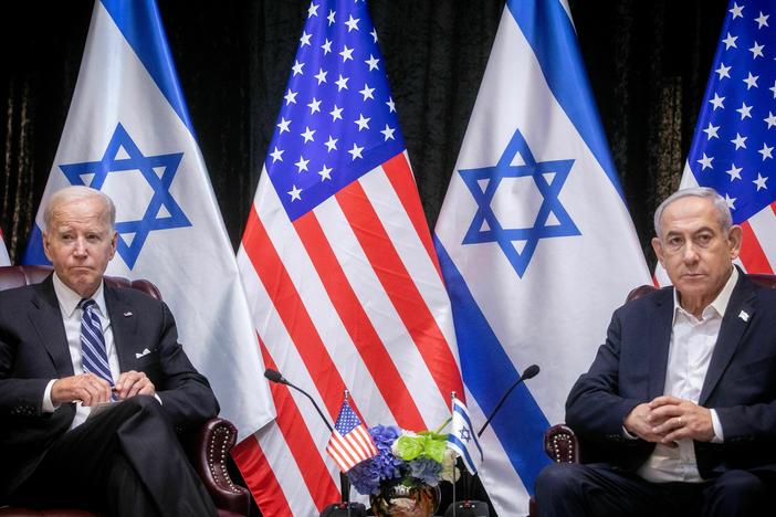 President Biden sits with Israeli Prime Minister Benjamin Netanyahu, at the start of the Israeli war cabinet meeting, in Tel Aviv on Oct. 18, 2023.