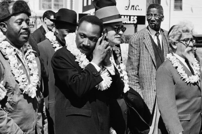 Civil rights activist Martin Luther King Jr marching from Selma to Montgomery, Alabama alongside Rabbi Abraham Joshua Heschel.