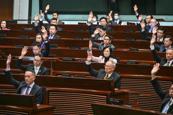 Lawmakers vote for Article 23 legislation in Hong Kong on Tuesday.