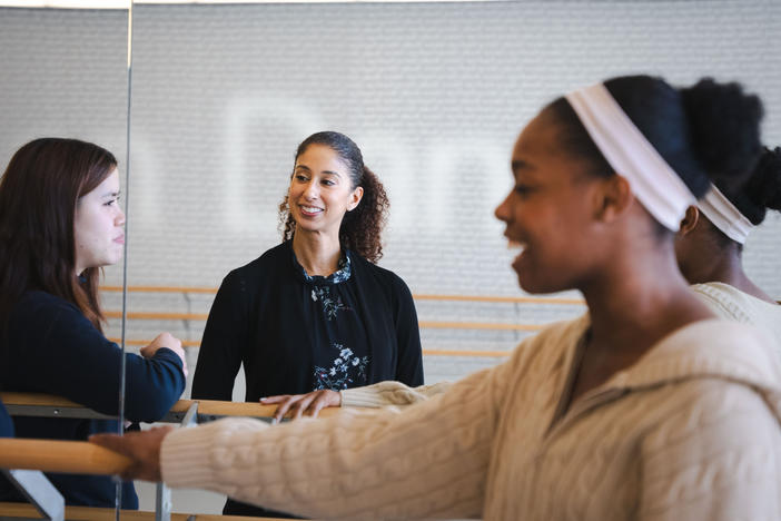 Alicia Graf Mack, dean and director of The Juilliard School's Dance Division (center), speaks with fourth-year dance students Kailei Sin (left) and Nyoka Wotorson (right) in between classes.