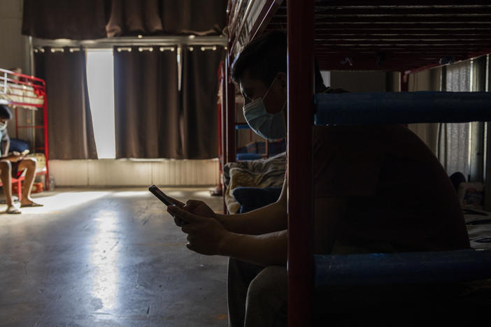 Warehouse workers often labor in extremely hot conditions in California, as do many others whose workplaces are indoors. The state has been considering new rules protecting them when temperatures soar to dangerous levels, but political headwinds have left the rules in limbo.