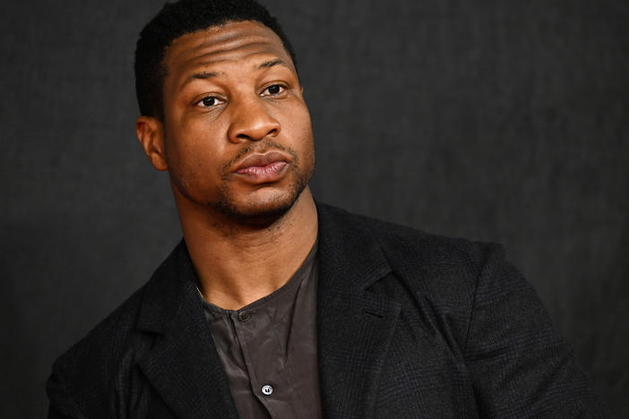 Actor Jonathan Majors attending the London premiere of his film <em>Creed III</em> in Feb. 2023, before his career imploded due to a series of abuse allegations and a court conviction in New York.