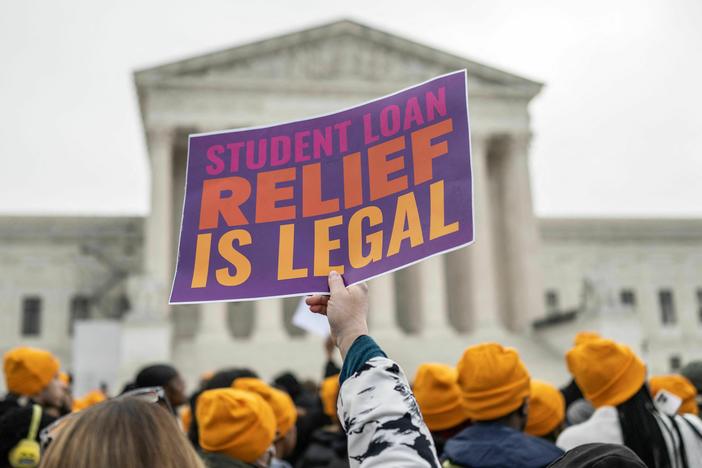 Activists and students protest in front of the Supreme Court during a rally for student debt cancellation in Washington, D.C., in February 2023.
