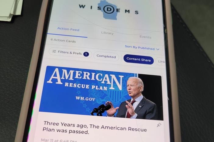 The Reach app, as seen on volunteer Sarah Harrison's phone, allows Biden supporters to share content directly with their contacts, and is connected to a national Democratic party voter database.