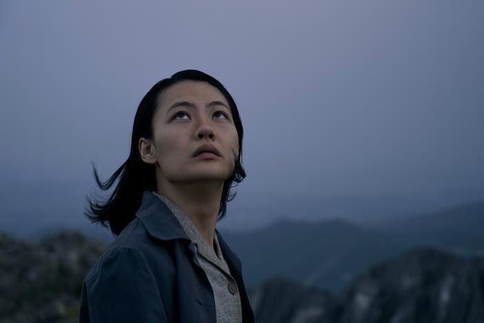 The new Netflix series brings to life a sprawling, successful Chinese novel outlining a new kind of alien invasion. Above, Zine Tseng in <em>3 Body Problem.</em>