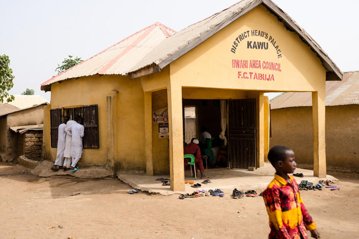 Community members gathered to discuss the events surrounding the kidnappings in their community at The Kawu District Palace which represents the seat of authority in the Kawu (spelled Kau on google maps). All official guests, meetings and pronouncements are made from the Palace.