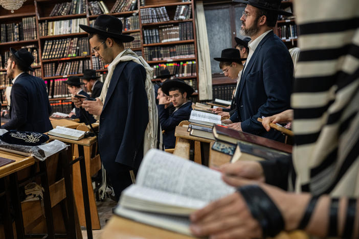 Ultra-Orthodox Jewish men pray at a yeshiva in Bnei Brak, Israel, on March 21. The war in Gaza has prompted calls for Israel to end military exemptions for full-time religious students.