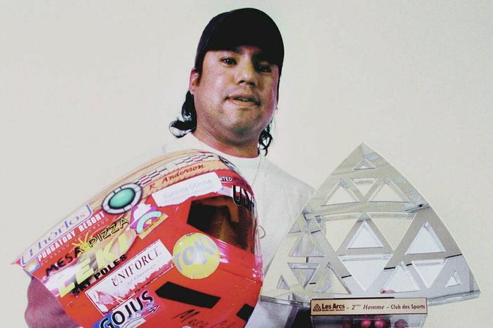 Professional speed skier Ross Anderson holds some of the trophies he won during the 2000-01 winter season. As an indigenous athlete and person of color, Anderson was a trailblazer in professional skiing.