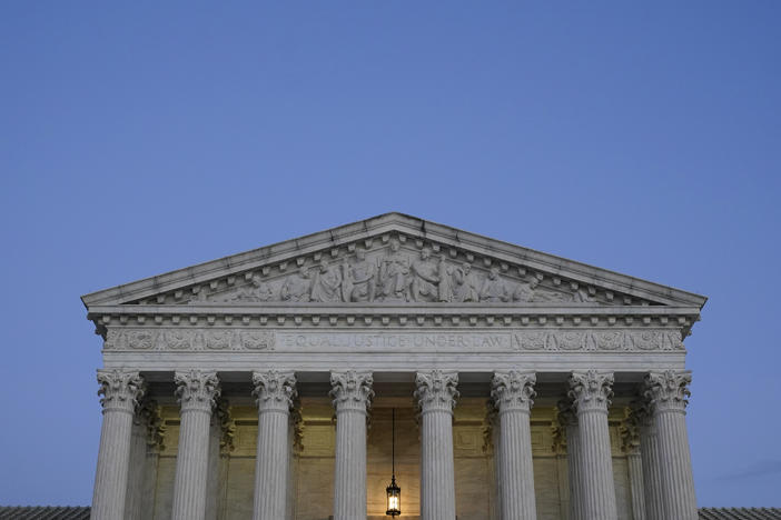 Light illuminates part of the Supreme Court building at dusk on Capitol Hill in Washington, D.C., on Nov. 16, 2022.