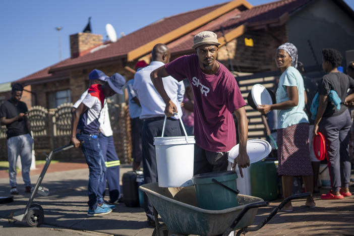 South Africans have had to line up for water as the country's largest city, Johannesburg, confronts a collapse of its water system affecting millions of people.