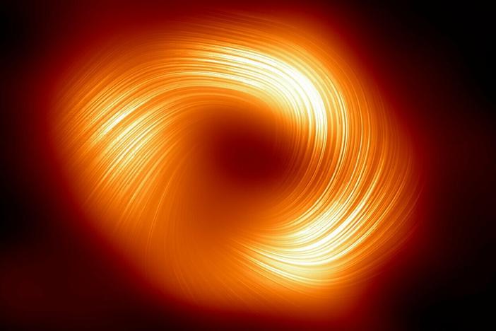 For the first time, we're seeing the Sagittarius A* black hole in polarized light. The Event Horizon Telescope collaboration says the image offers a new look at "the magnetic field around the shadow of the black hole" at the center of the Milky Way.