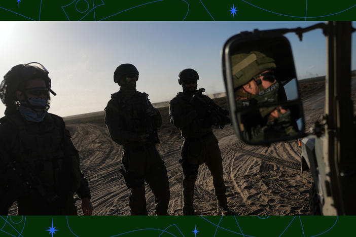 Israeli soldiers are seen near the Gaza Strip border in southern Israel, Monday, March 4, 2024.
