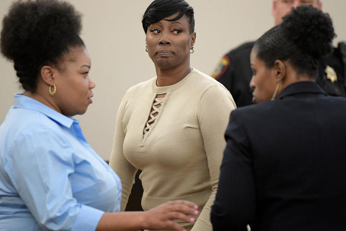 Crystal Mason, center, at the Tim Curry Justice Center in Fort Worth, Texas, on May 25, 2018.