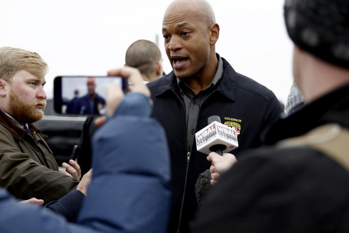 Maryland Gov. Wes Moore speaks to reporters near the collapsed Francis Scott Key Bridge on March 27, 2024 in Baltimore, Md.