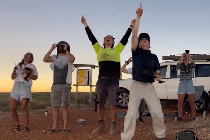 Science writer David Baron views the beginning of a solar eclipse with friends in Western Australia in 2023. Baron says getting to see the solar corona during a total eclipse is "the most dazzling sight in the heavens."