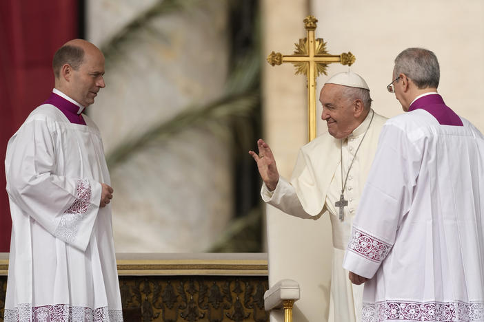 Pope Francis arrives as he celebrates Easter mass in St. Peter's Square at the Vatican, Sunday, March 31, 2024.