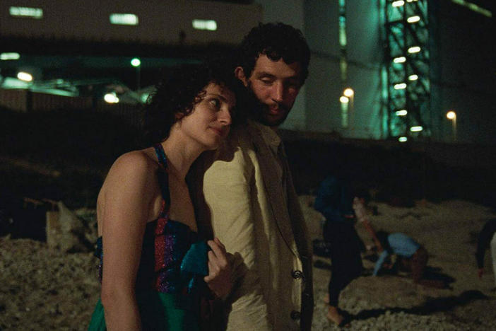 Carol Duarte and Josh O'Connor in <em>La Chimera</em>.
