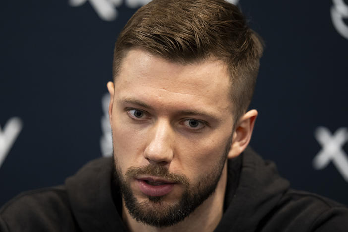 Philadelphia Flyers' Ivan Fedotov takes questions from the media during an NHL hockey press conference, Friday, March 29, 2024, in Voorhees, N.J. Nine years after he was drafted by Philadelphia, goalie Ivan Fedotov has joined the Flyers.