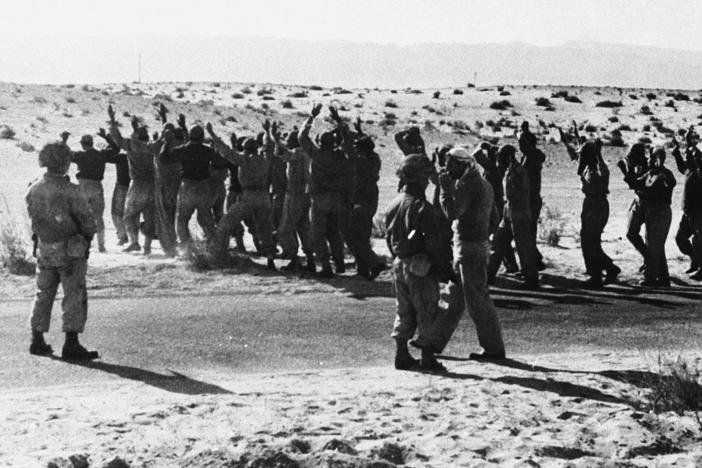 Israeli troops round up Egyptian soldiers captured during fighting in 1956 in the Rafah area of the Gaza Strip, which was controlled by Egypt at the time. Israel, Britain and France invaded Egyptian territory after Egypt moved to nationalize the Suez Canal. But U.S. President Dwight Eisenhower intervened, leading to the withdrawal of foreign troops, including the Israeli forces in Gaza.