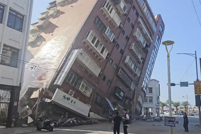In this image taken from a video footage run by TVBS, a partially collapsed building is seen in Hualien, eastern Taiwan on Wednesday, April 3, 2024.