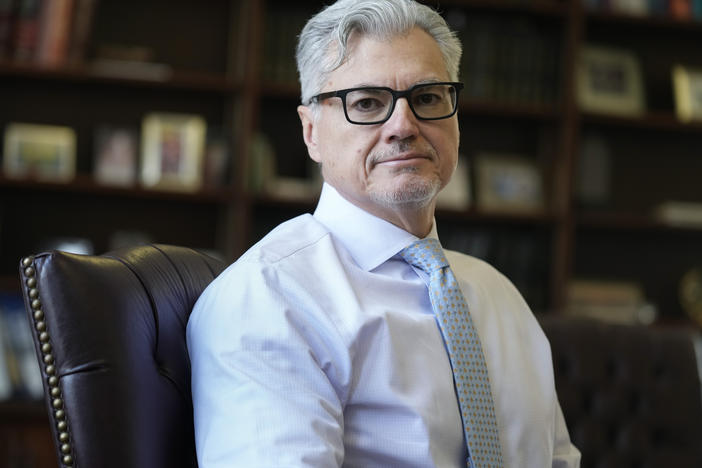 Judge Juan M. Merchan poses in his chambers in New York on March 14, 2024.