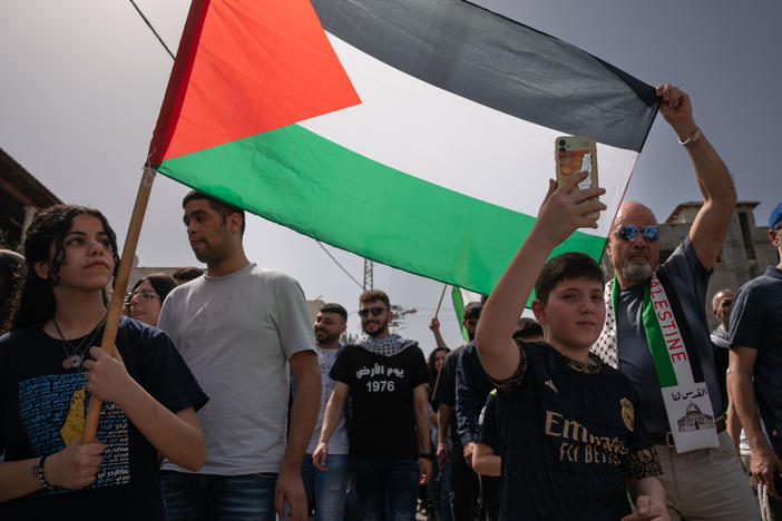 Palestinian citizens of Israel hold an anti-war protest in the town of Deir Hanna, Israel, on March 30.