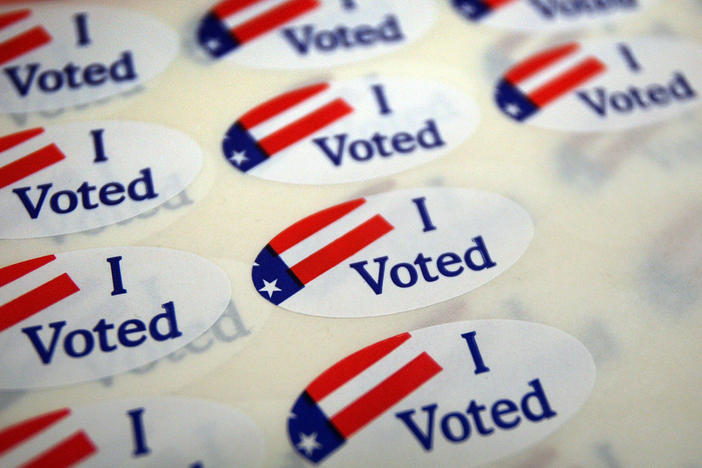 A sheet of voter stickers is seen inside a polling place in California.