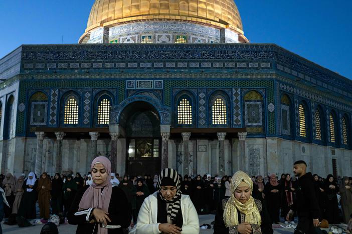 Palestinian women pray outside the Dome of the Rock in East Jerusalem during the Muslim holy month of Ramadan, on April 3.