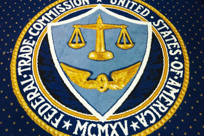 A 2014 file photo of the seal of the Federal Trade Commission in a carpet a FTC headquarters in Washington, DC. The organization is trying to raise consumer awareness about the use of artificial intelligence tools to create convincing audio deepfakes.