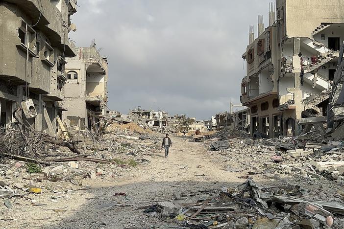 Palestinians returning to Khan Younis to survey the damage to their homes after Israeli forces withdrew from the city following a four-month battle with Hamas there.