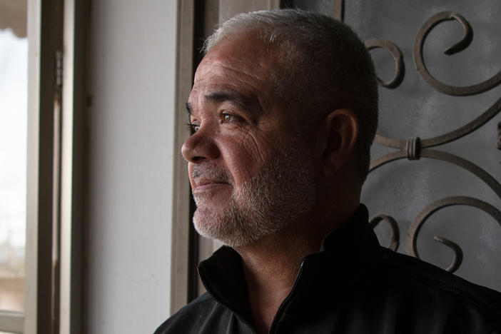 Pastry maker Rafe' Rummaneh, shown here in his home outside Ramallah in the occupied West Bank on April 9, is only making a few treats for friends this Eid.
