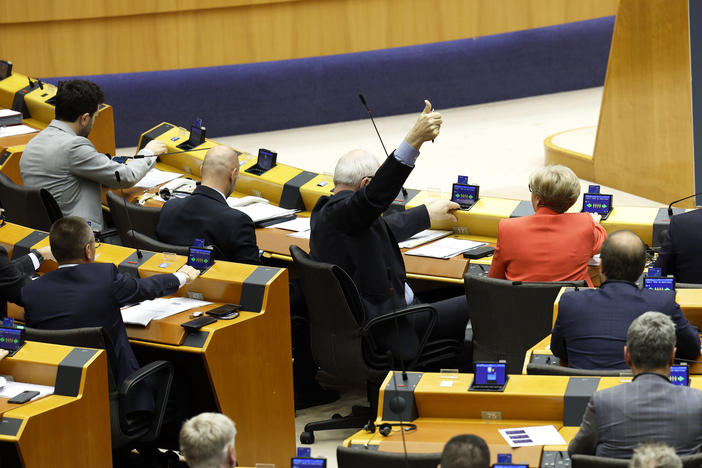 Members of European Parliament participate in a series of votes as they attend a plenary session at the European Parliament in Brussels, Wednesday, April 10, 2024.