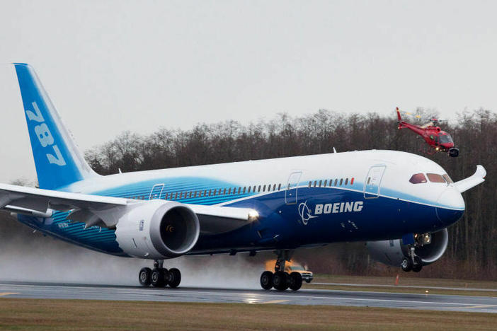 A Boeing 787 Dreamliner accelerates down the runway during its first flight in December, 2009 in Everett, Wash.