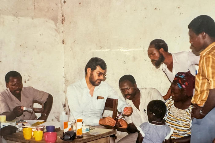 Joel Breman trains scientists in malaria diagnosis in Côte d'Ivoire, 1986. Breman died this month at age 87.
