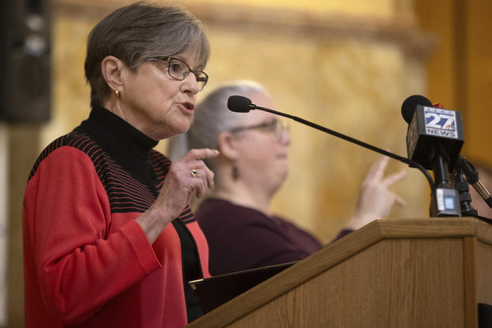 Kansas Gov. Laura Kelly speaks about the necessity to expand Medicaid in the state during a rally on March 6 in Topeka. Kelly on Friday vetoed a proposed ban on gender-affirming care for minors.