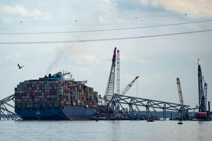 The cargo ship Dali is pictured on April 10 amid the wreckage of the Francis Scott Key Bridge in the Patapsco River in Baltimore.