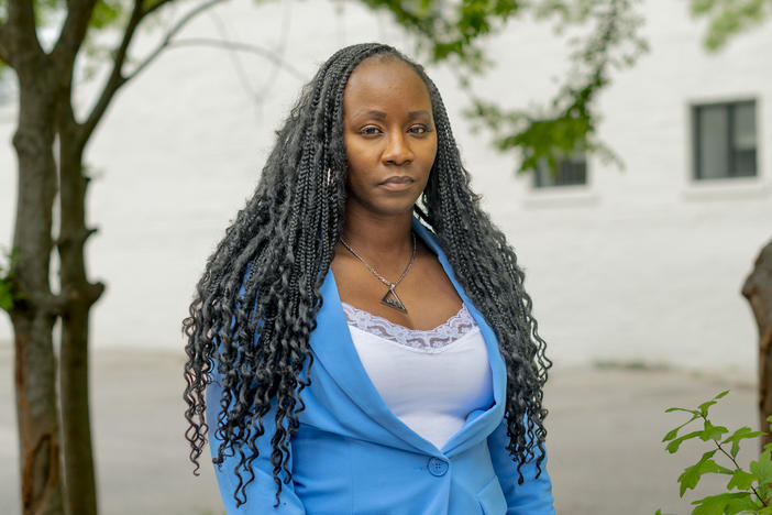 Shalela Dowdy, a plaintiff in a lawsuit challenging Alabama's congressional districts, poses for a portrait on Government Street in Mobile, Ala., on April 1.