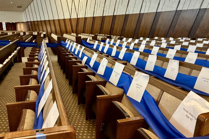 At Sinai Temple in west Los Angeles, blue ribbon marks off more than 130 seats that stand as reminders of the hostages who remain in Gaza following the Oct. 7 attack on Israel