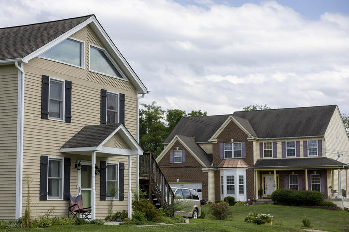 Some baby boomers would like to downsize from their large homes, but say it doesn't make financial sense. Single-family homes in Dumfries, Va., are seen here last year.
