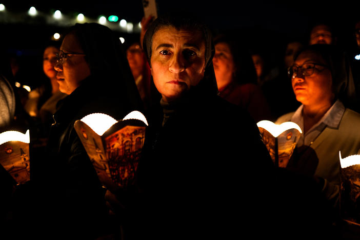 Christians hold a candlelight procession in Jerusalem outside the Church of All Nations, also known as the Church of Gethsemane, on March 28. This year, Easter, Purim and Ramadan overlapped for the first time in three decades.